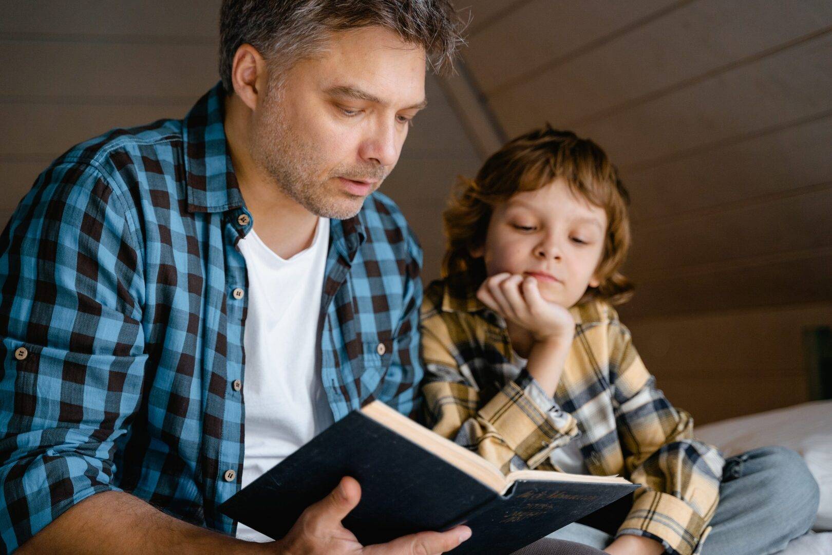 Adult and child reading