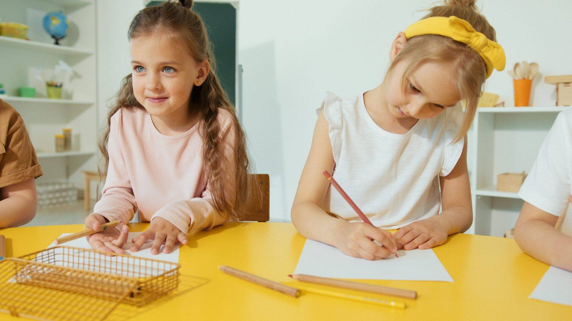 Two students writing